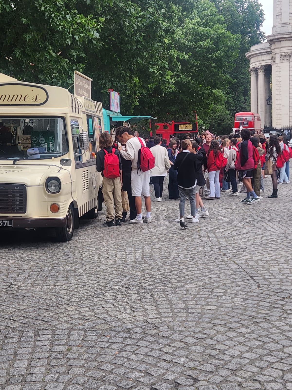 Vintage ice cream van with queue of customers